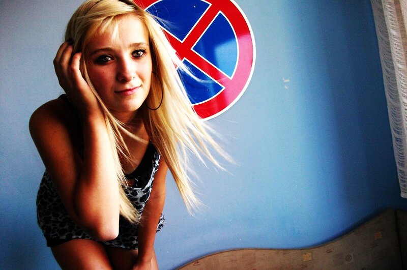 blonde woman with peace sign