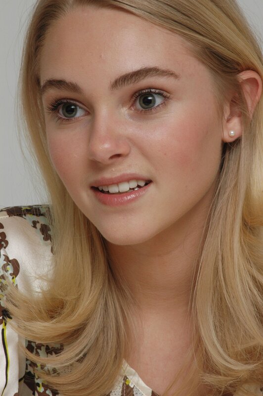 blonde woman with pearl earring