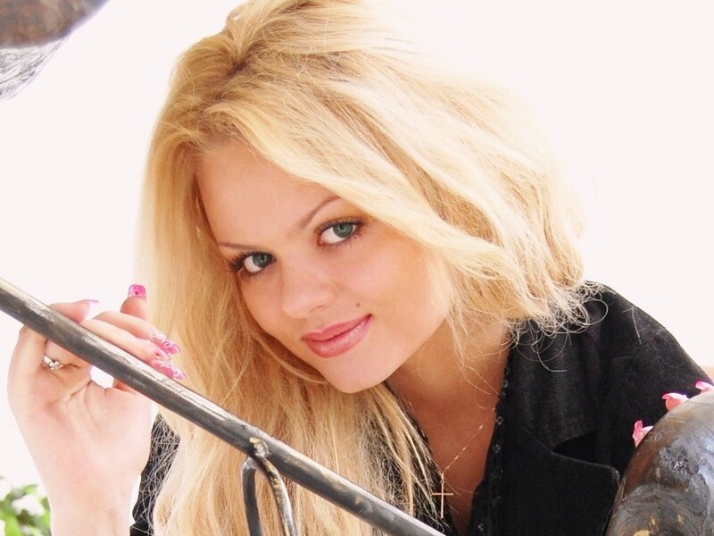 blonde woman with pink nails