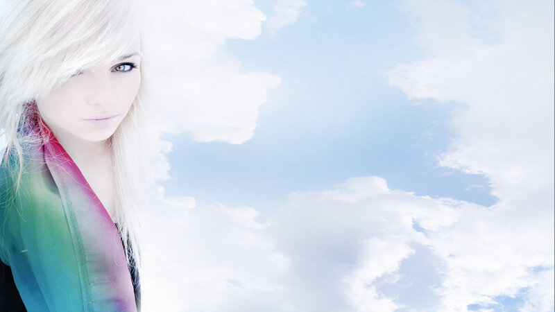 blonde woman with rainbow scarf