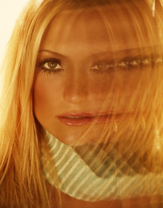 blonde woman with striped scarf