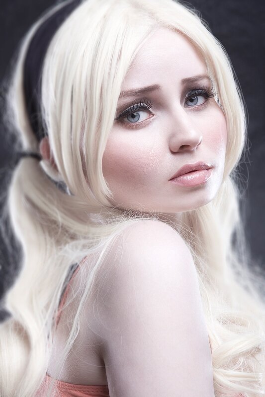 blonde woman with tears