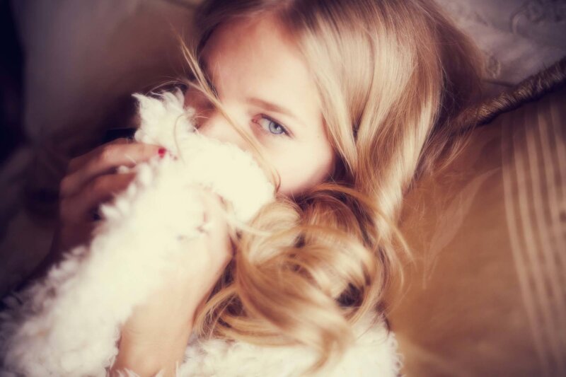 Blonde Woman with Toy