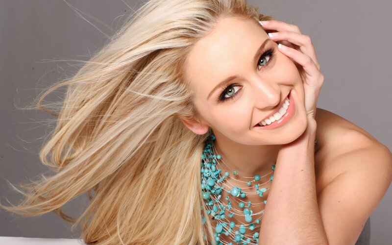 blonde woman with turquoise necklace