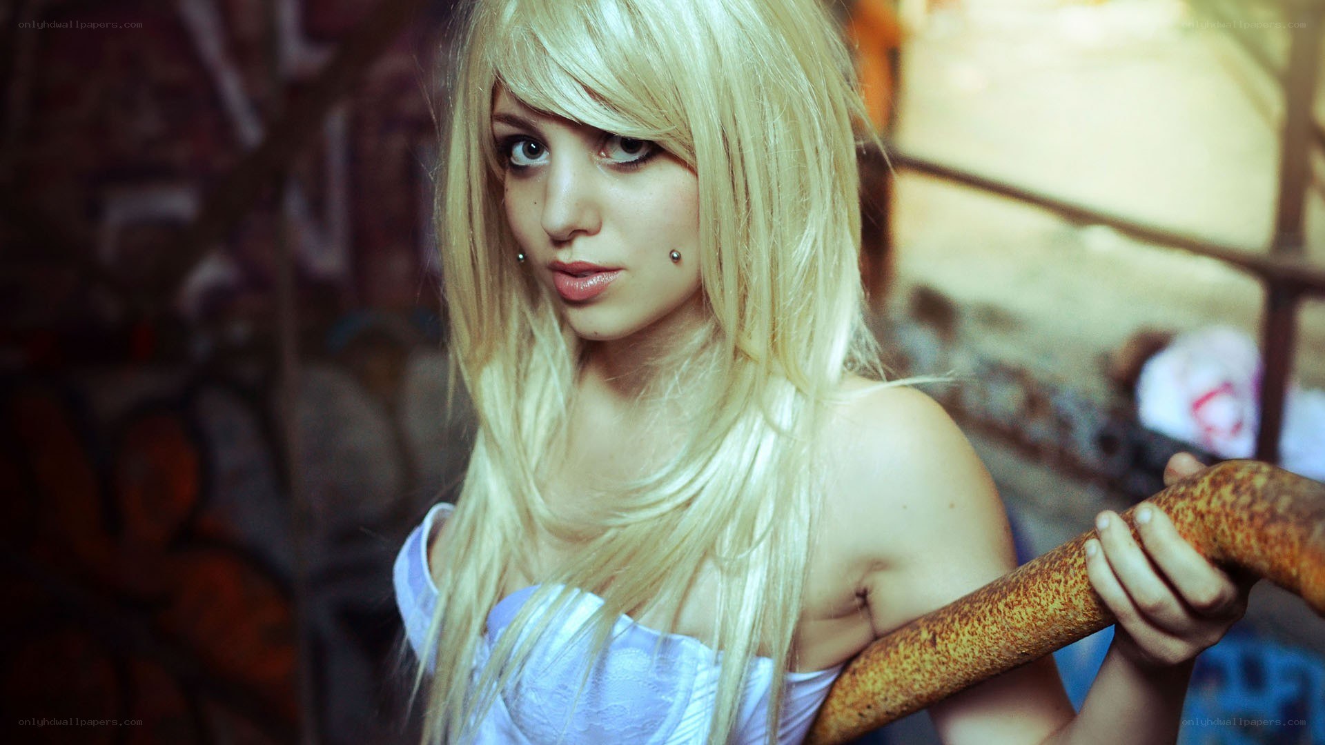blonde woman with weapon