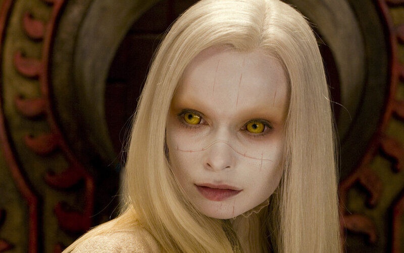 blonde woman with yellow eyes