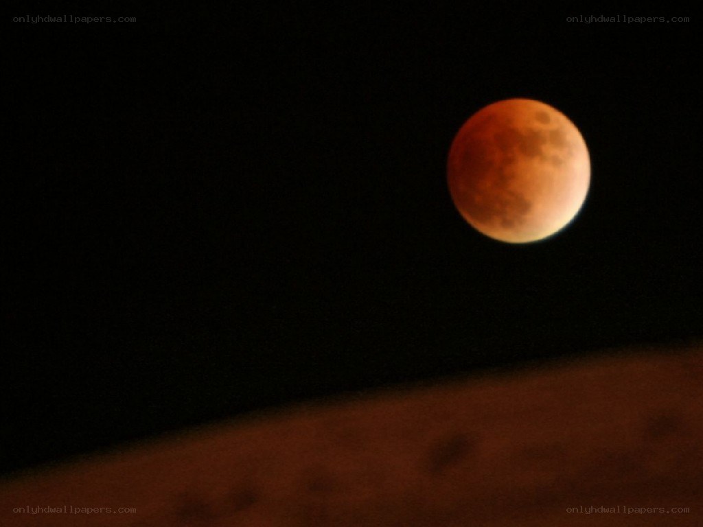 Blood moon in night sky