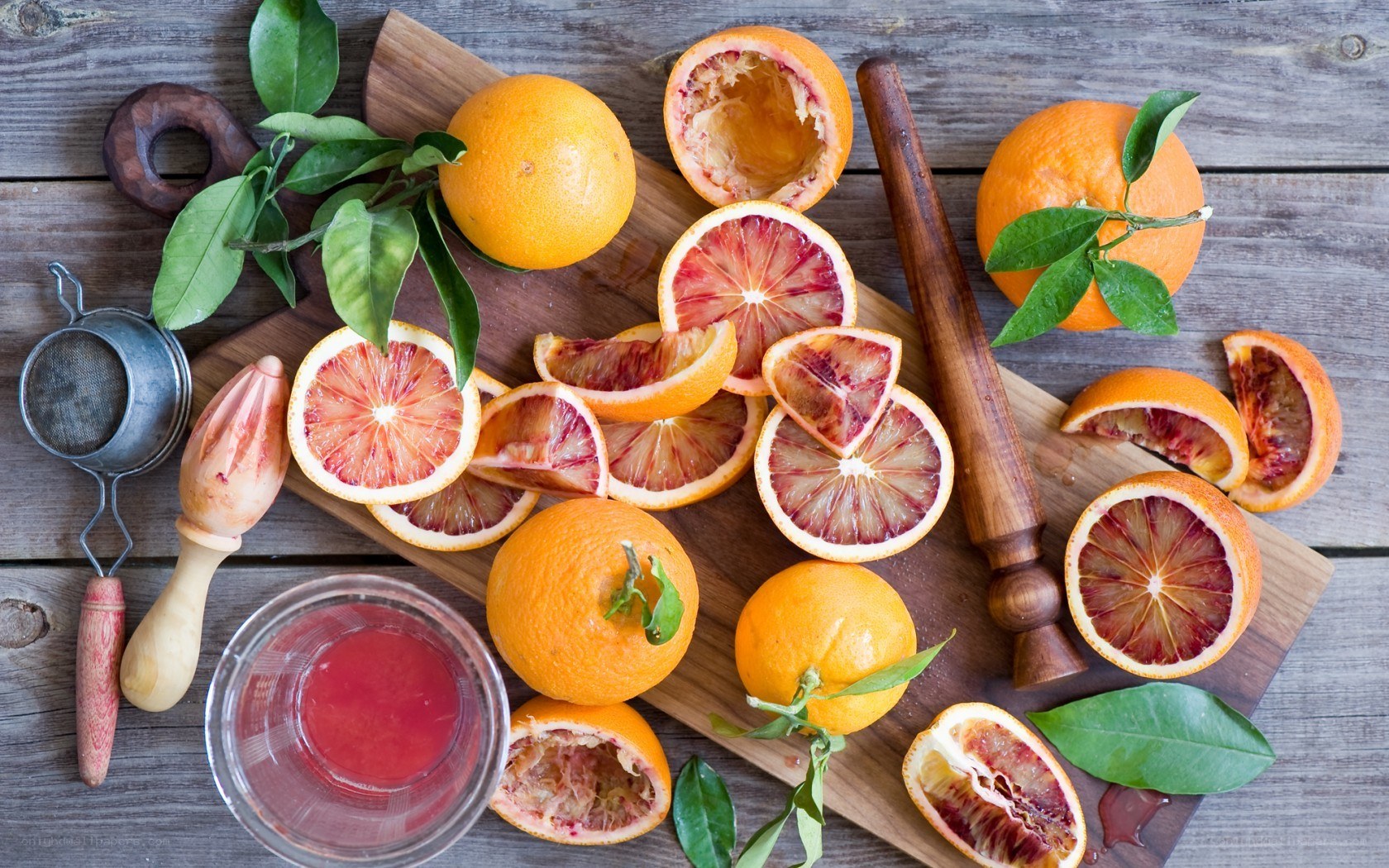 Blood oranges on wooden table