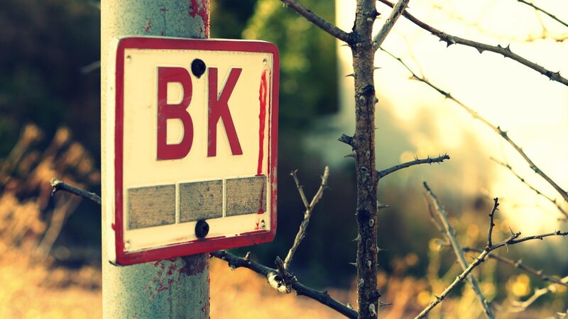Blood-stained Sign on Pole