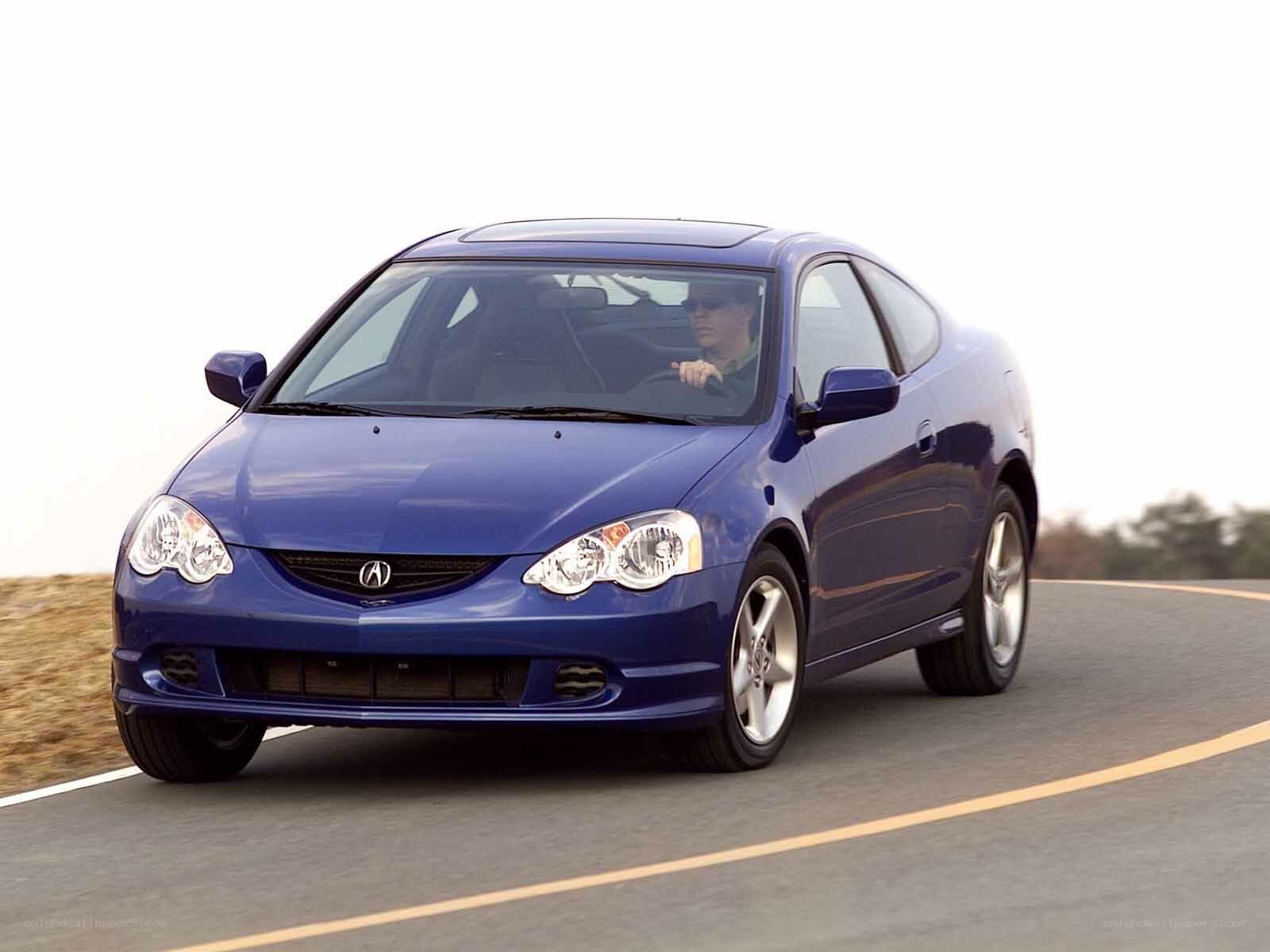 blue acura coupe on road