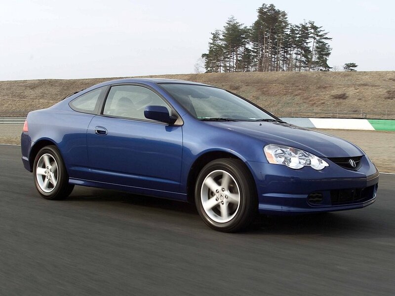 blue acura coupe on track