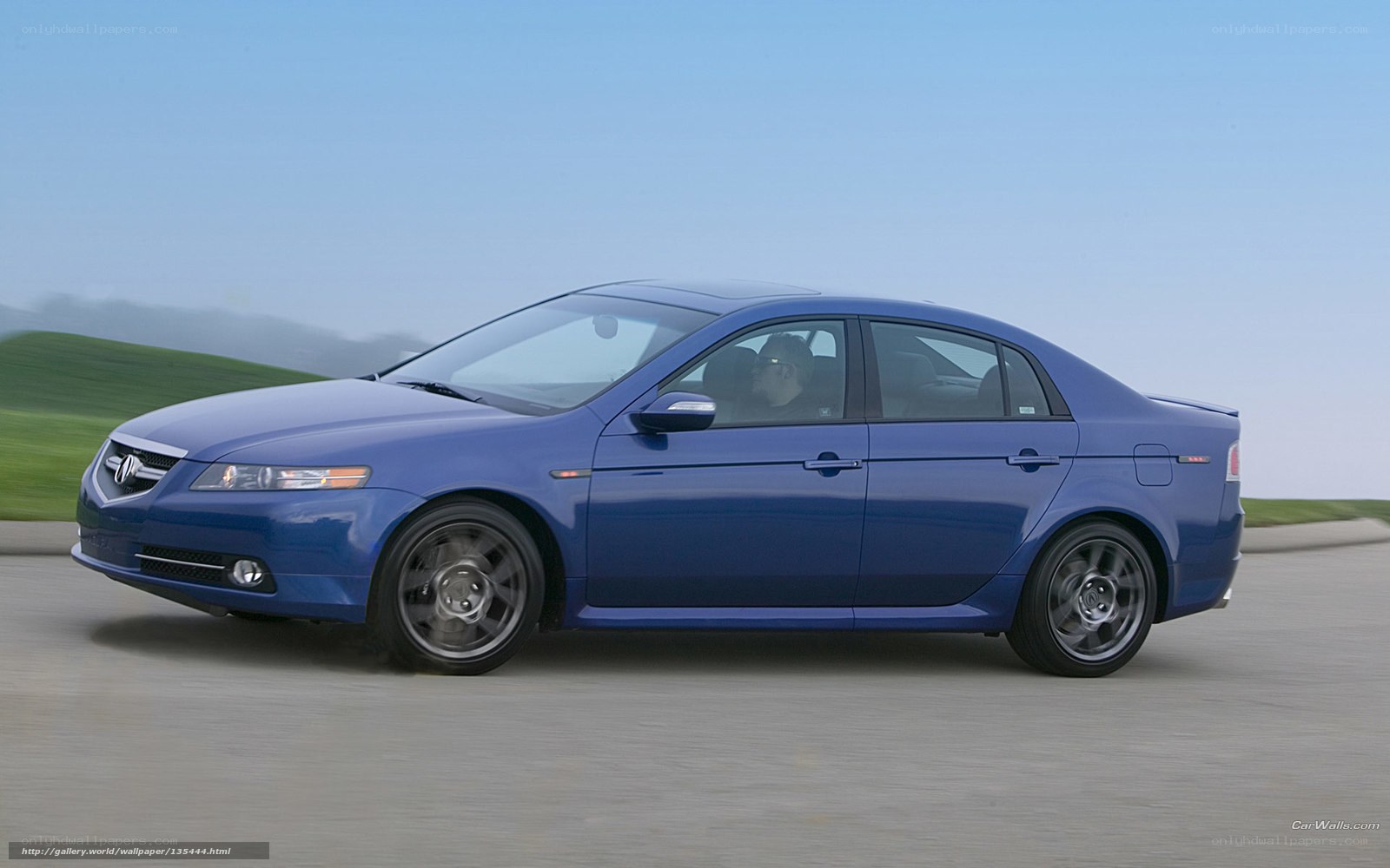 blue acura tl in motion