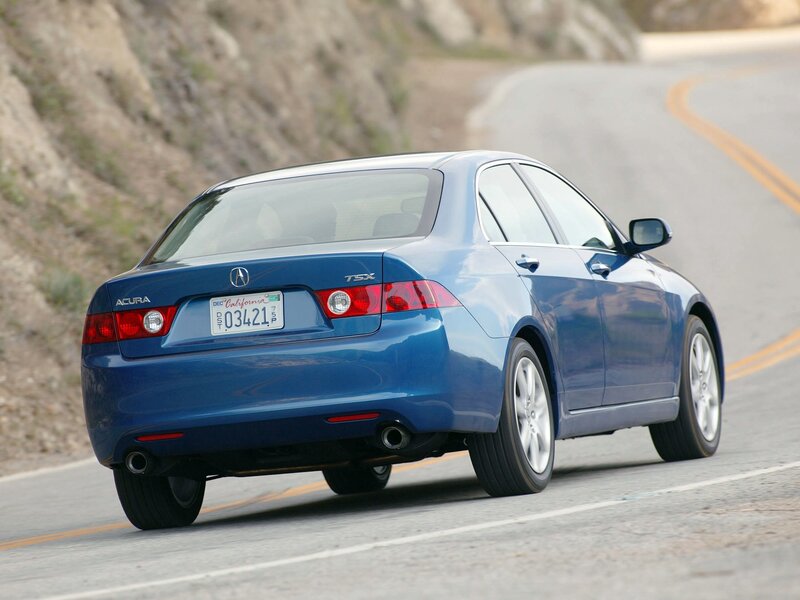 blue acura tsx on winding road