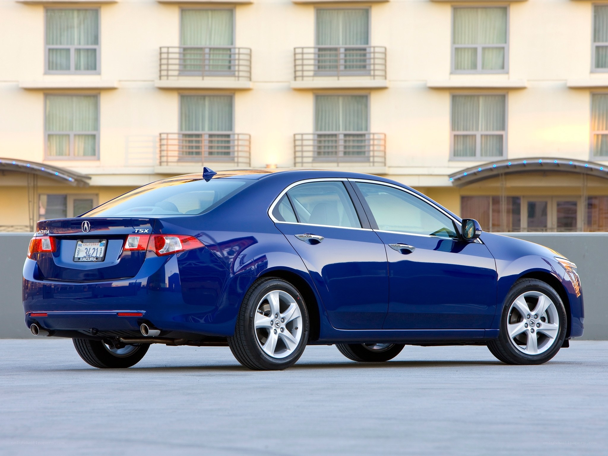 Blue Acura TSX sedan