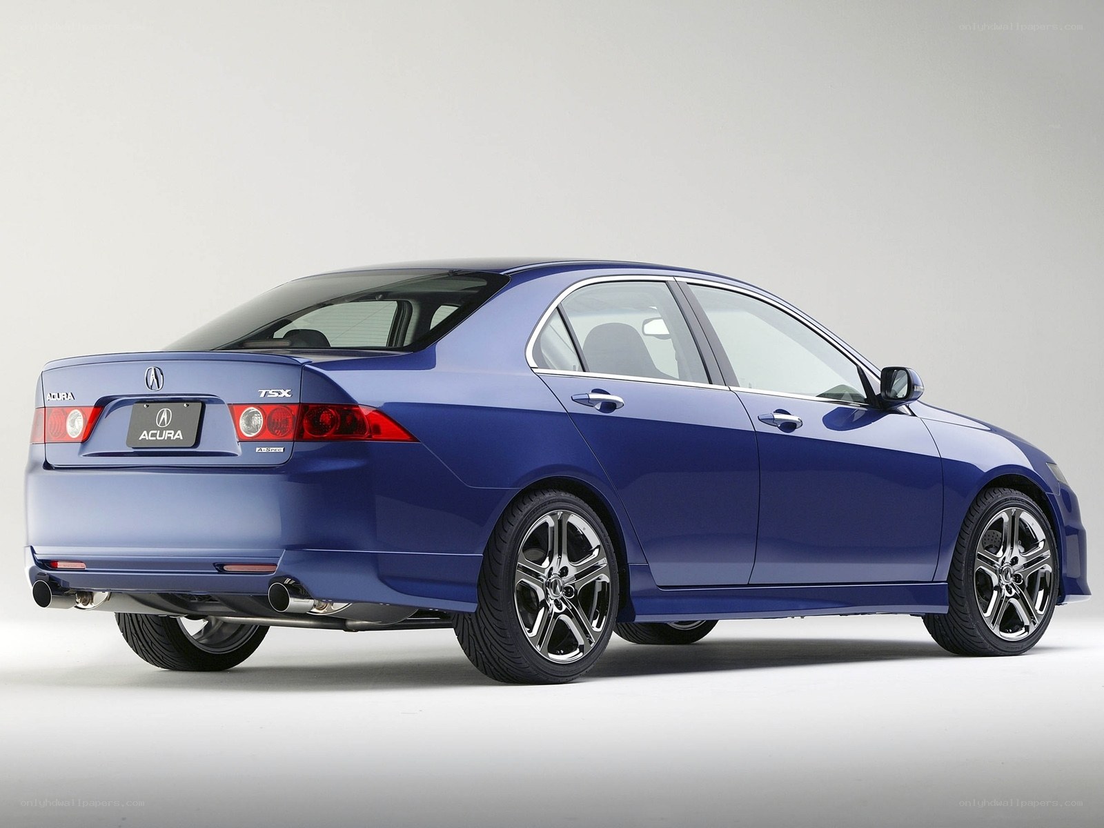 Blue Acura TSX sedan