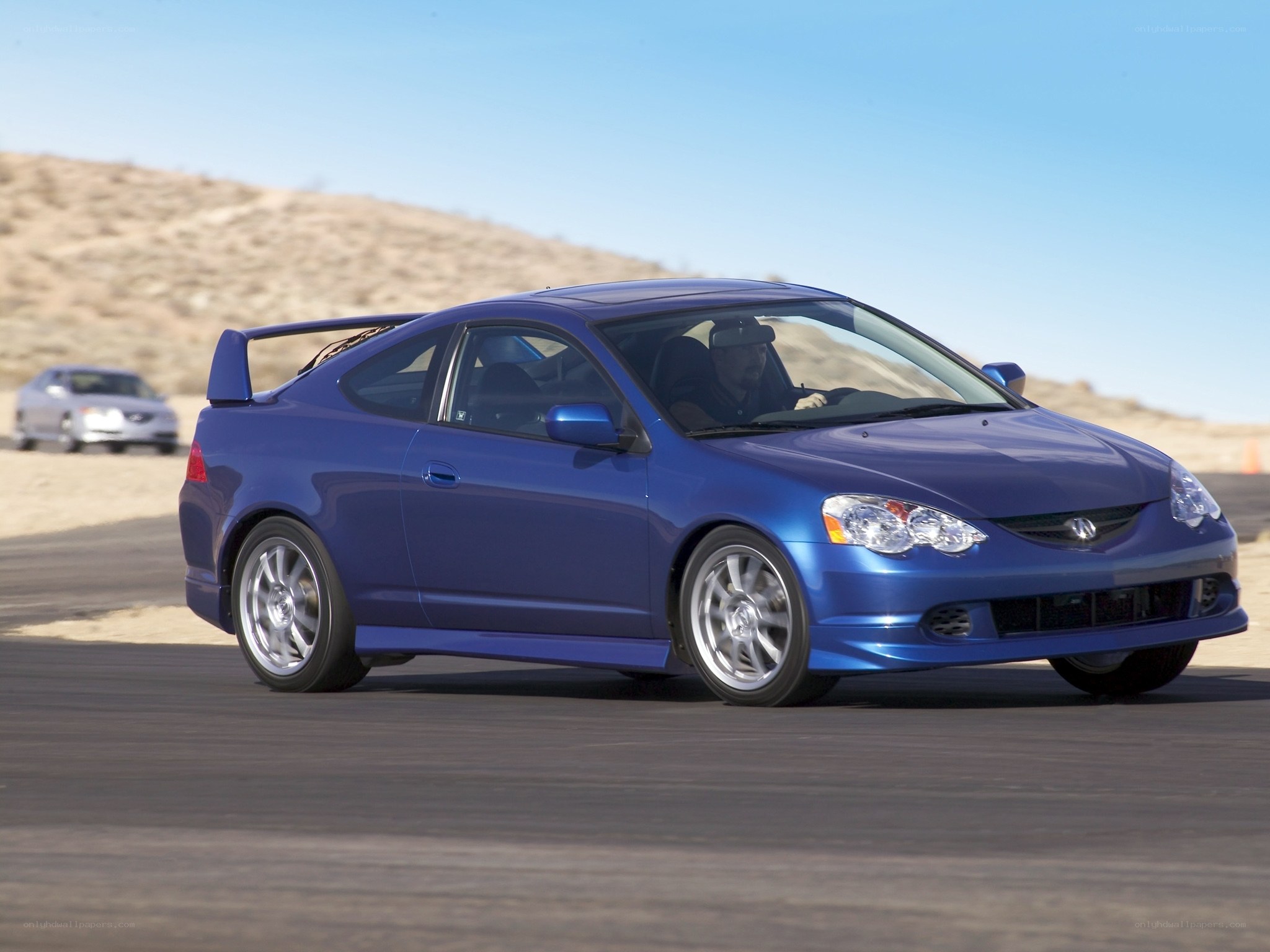 blue acura type s on track