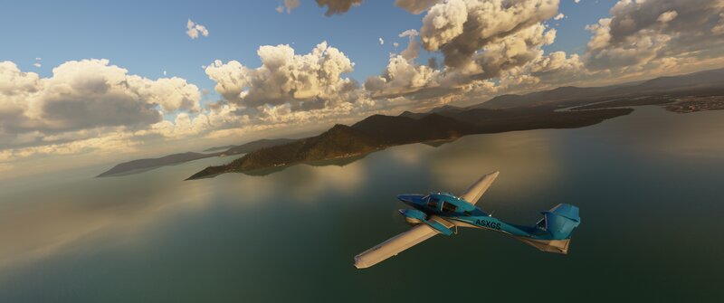 Blue Airplane Flying — Serene