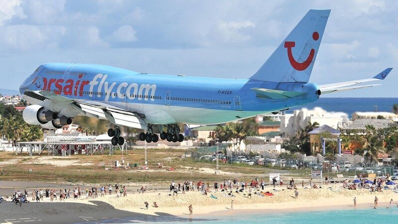 Blue Airplane Landing