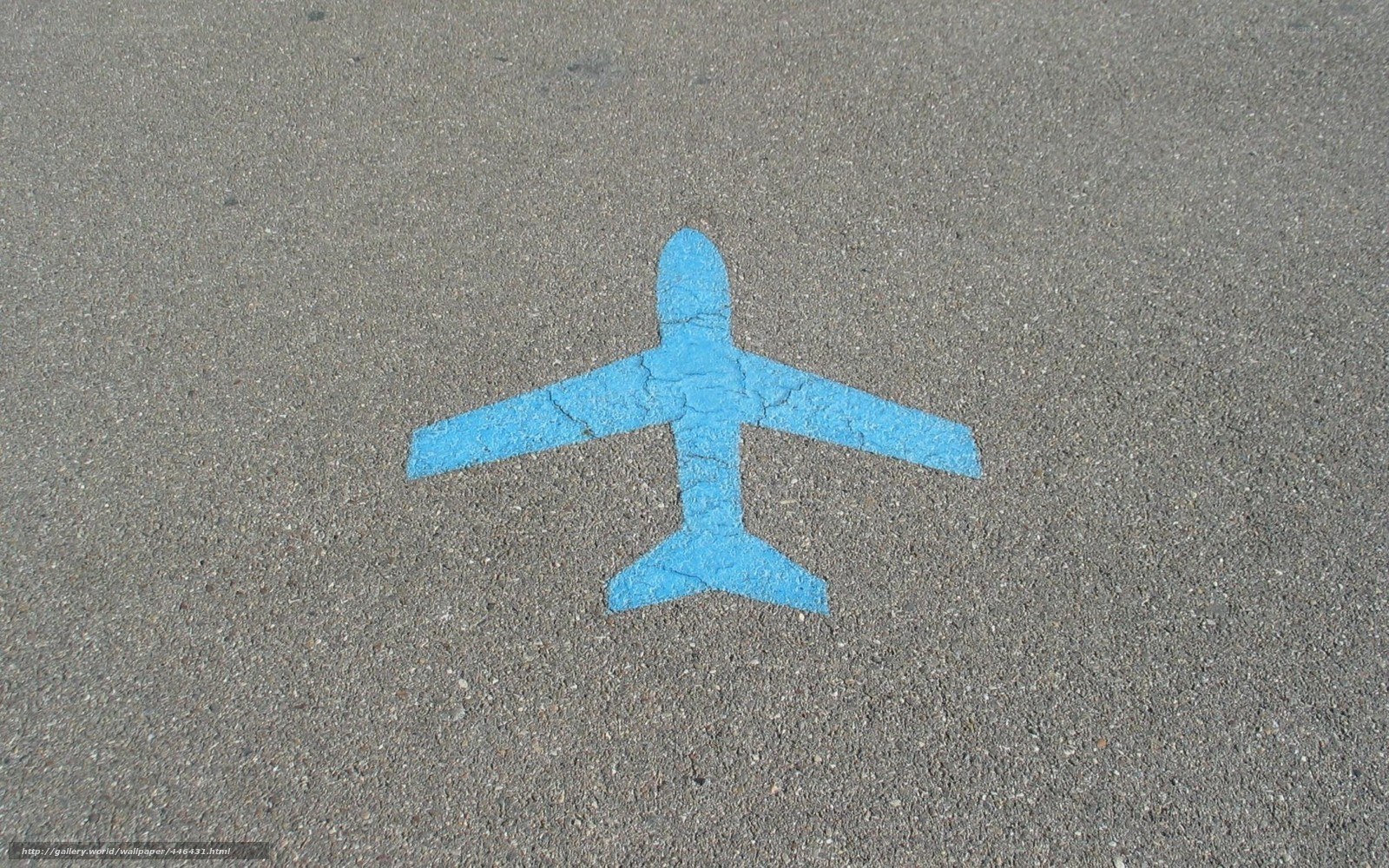 Blue airplane painted on pavement