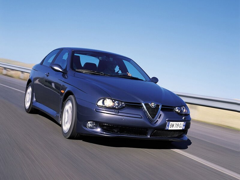 blue alfa romeo driving on road