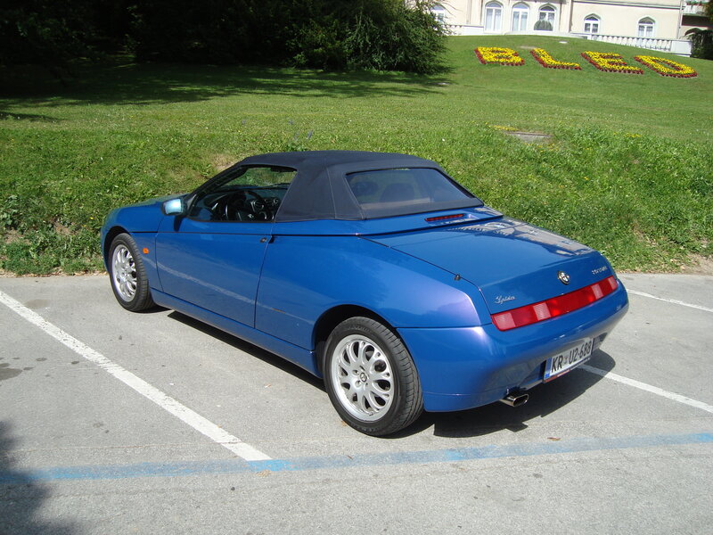 Blue Alfa Romeo Spider parked
