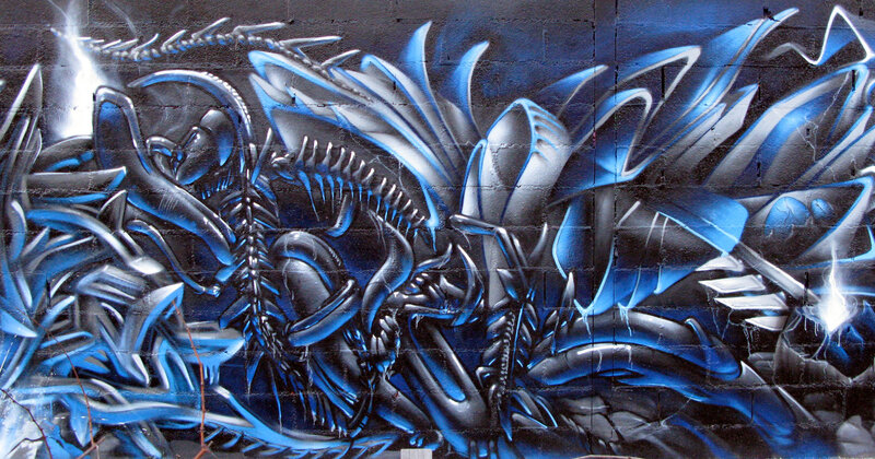Blue alien creature graffiti