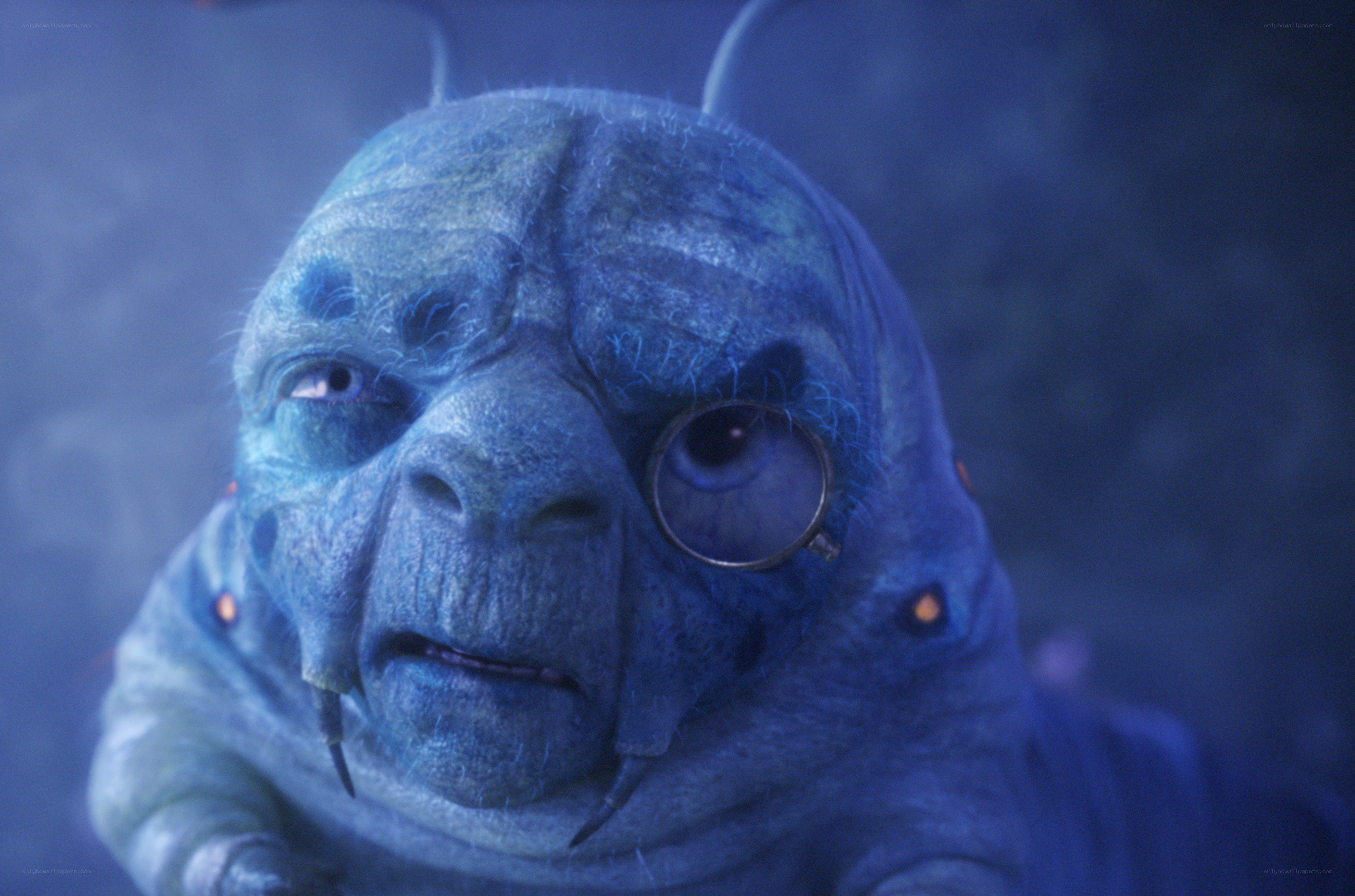 blue alien with monocle