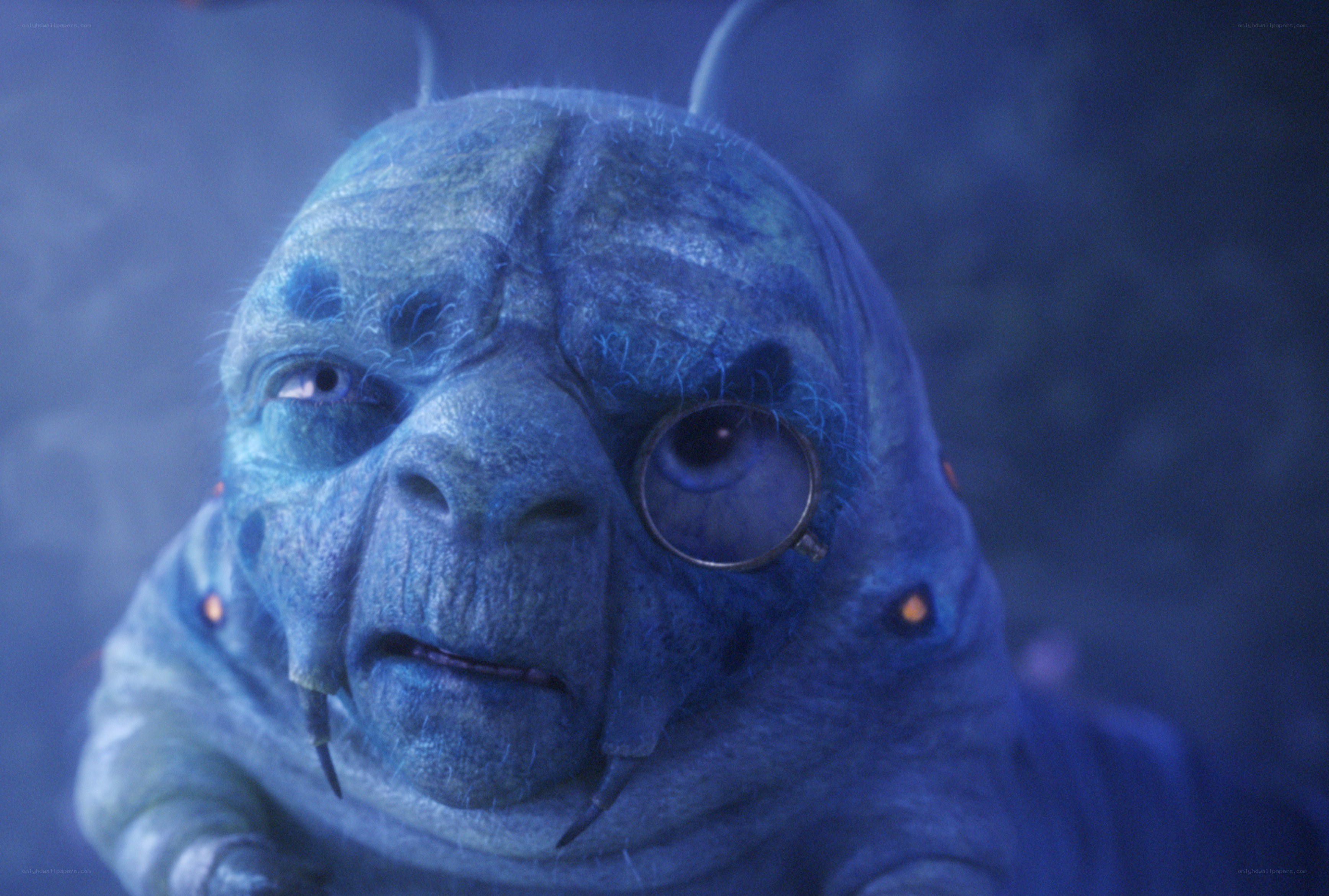 blue alien with monocle