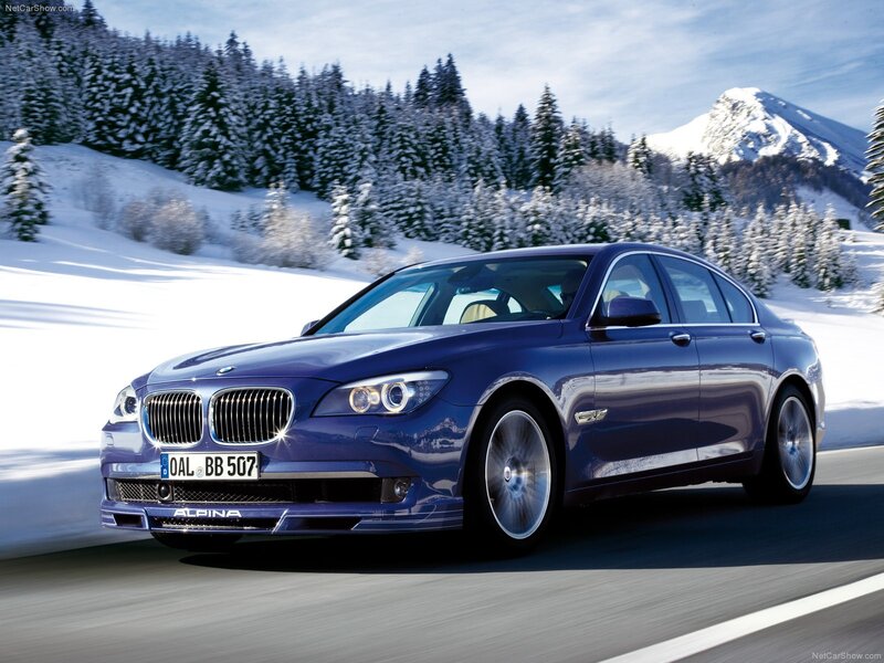 Blue Alpina-BMW driving on snowy road