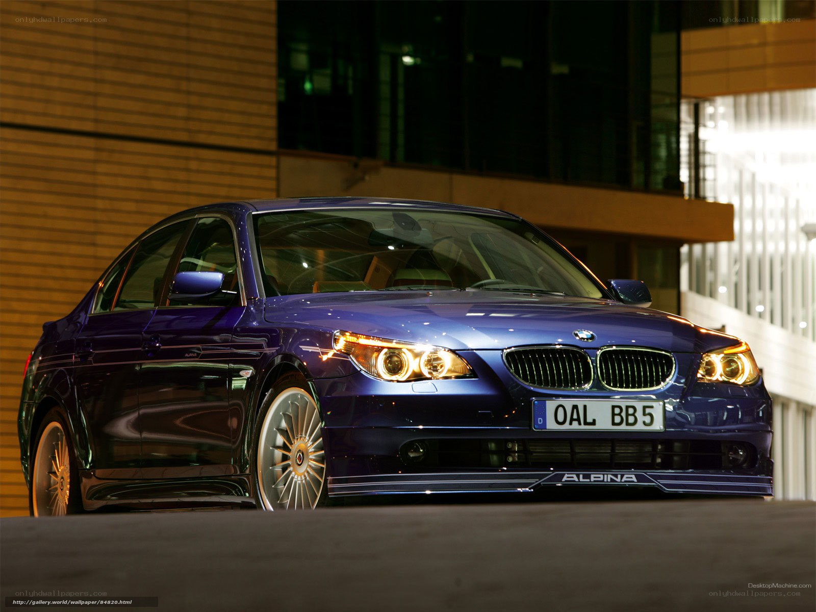 blue alpina car at night