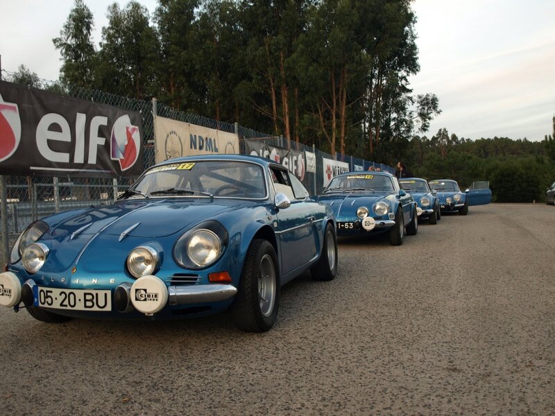 Blue Alpine rally cars in line