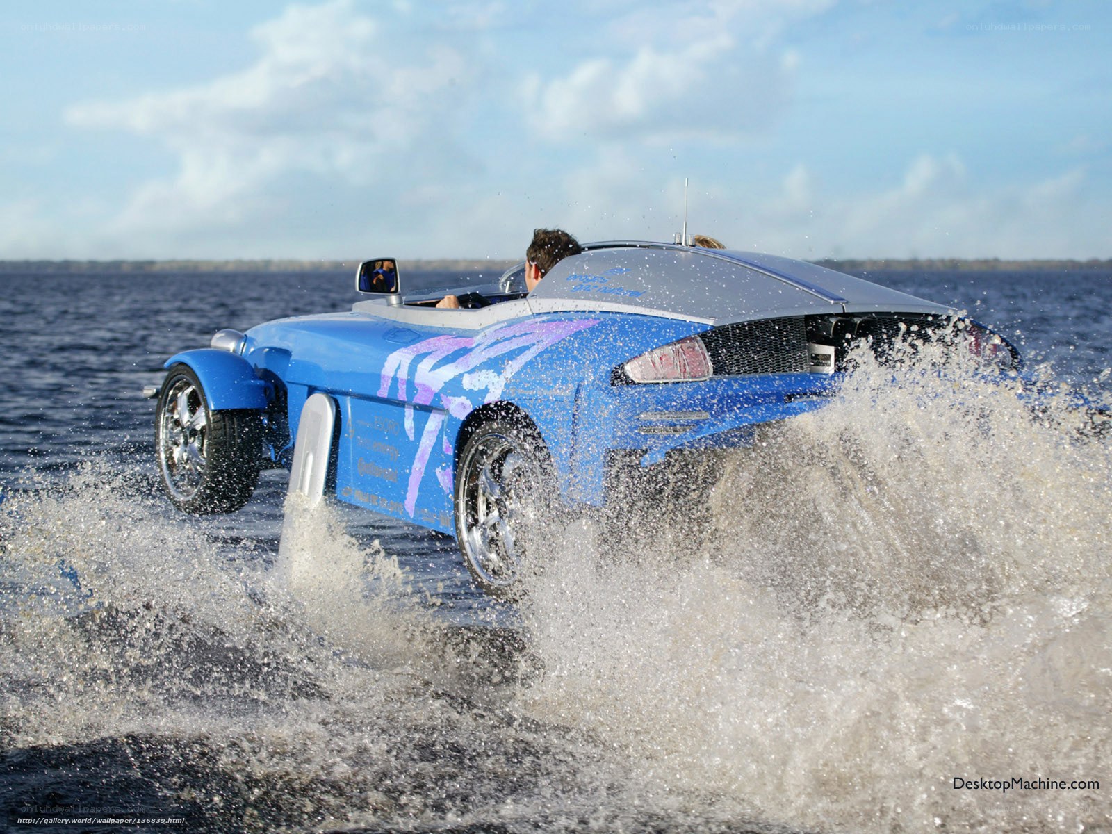 blue amphibious car on water