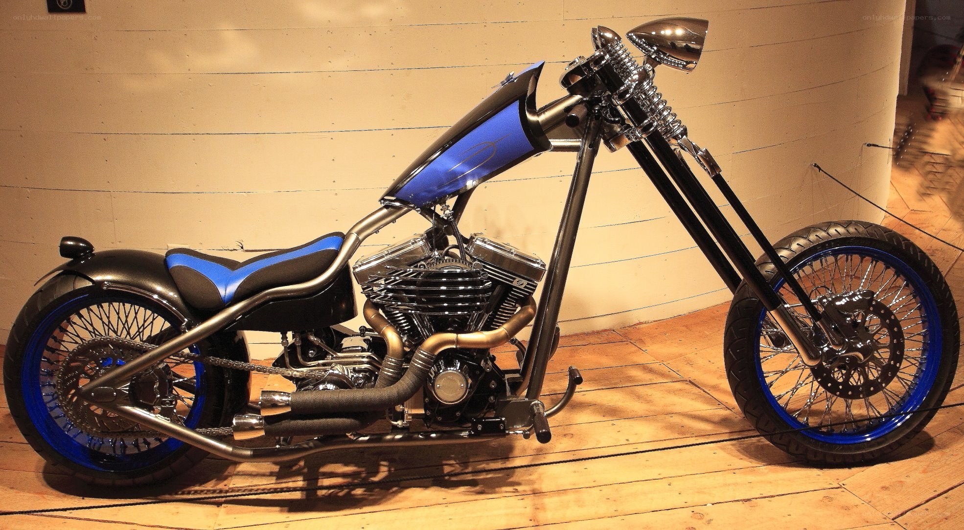 blue and black chopper motorcycle