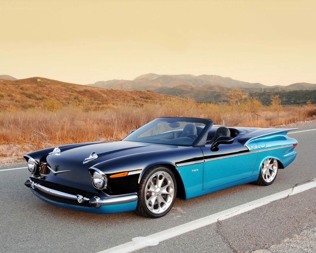 Blue and black classic convertible