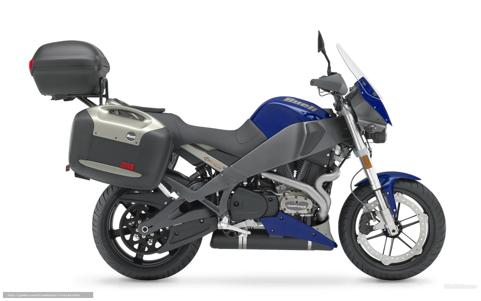 blue and black motorcycle with luggage