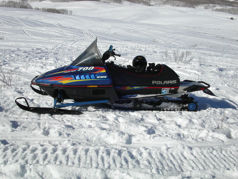 Blue and Black Snowmobile