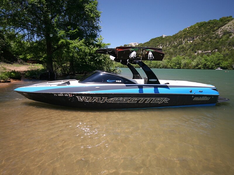 Blue and Black Speedboat