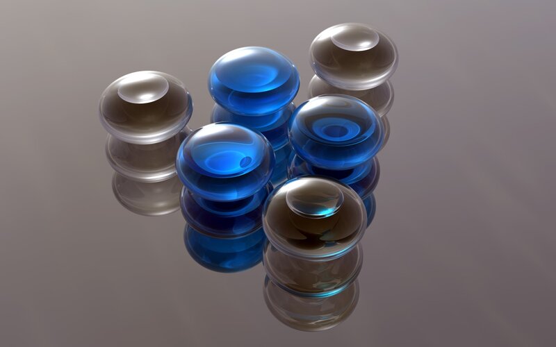 Blue and clear glass spheres
