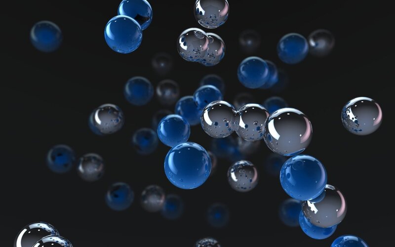 Blue and clear spheres floating