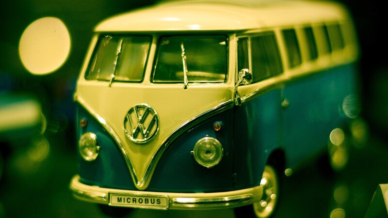 Blue and cream toy bus