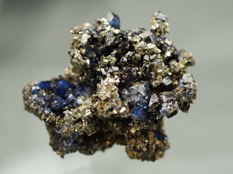 blue and gold mineral cluster