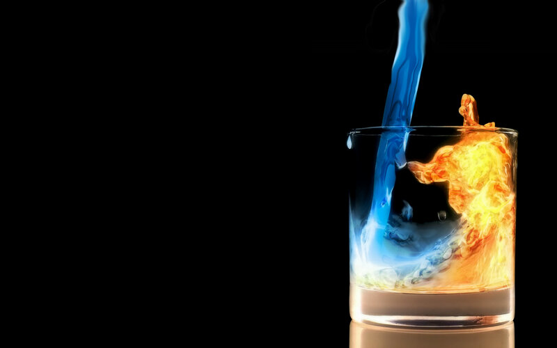 Blue and Orange Liquid in Glass — Dramatic