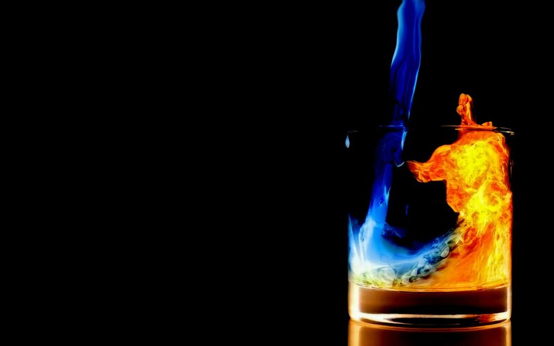Blue and Orange Liquid in Glass