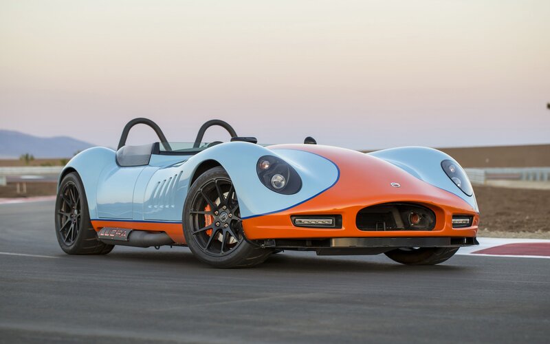 Blue and Orange Race Car — Calm, Sunset