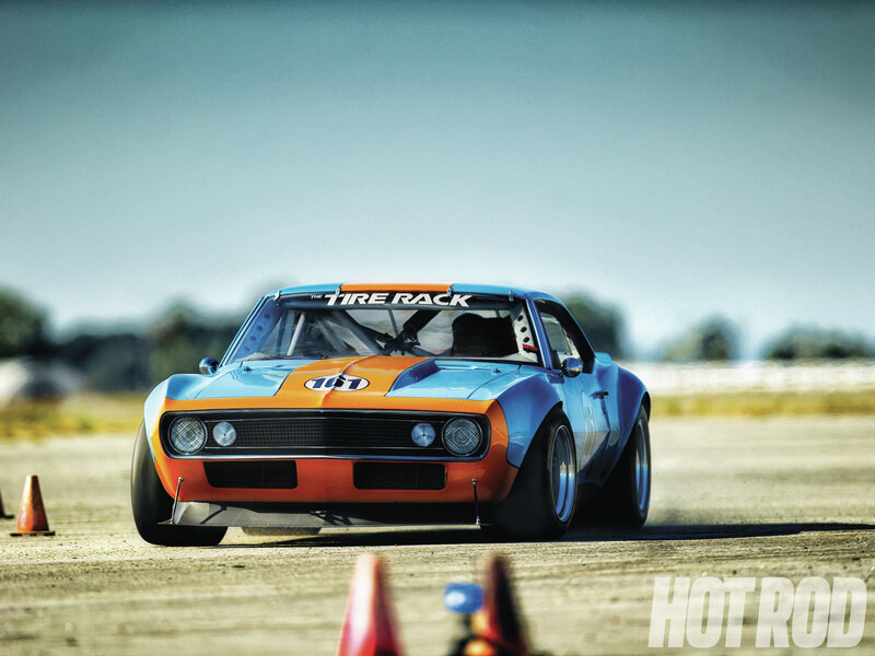 Blue and Orange Race Car — Dynamic, Afternoon, Photograph