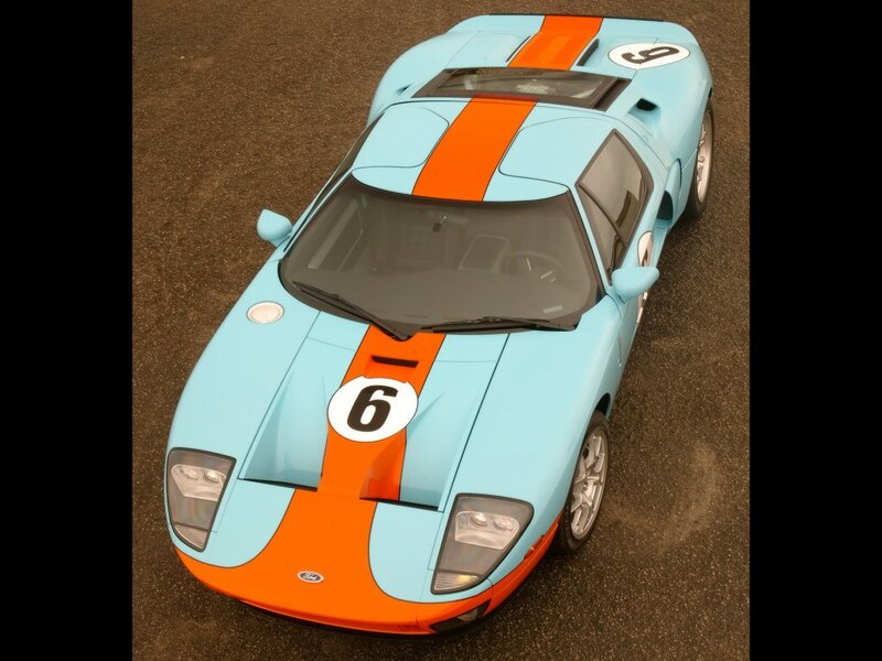 Blue and Orange Race Car — Light Blue, Dynamic, Photograph, Race Car, Number 6