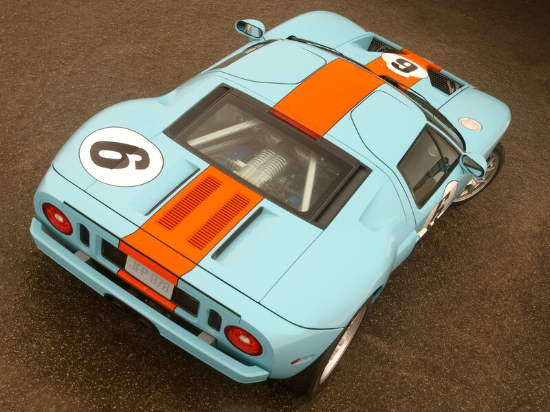 Blue and Orange Race Car — Light Blue, Dynamic, Photograph