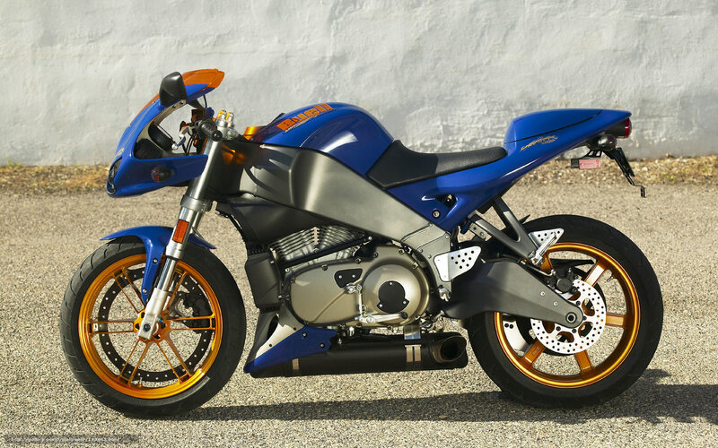 blue and orange sport motorcycle