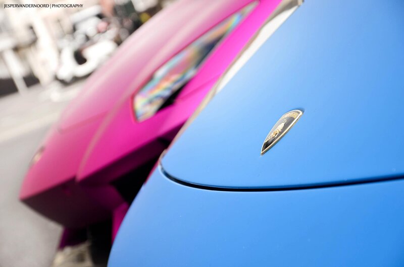 Blue and pink Lamborghini cars