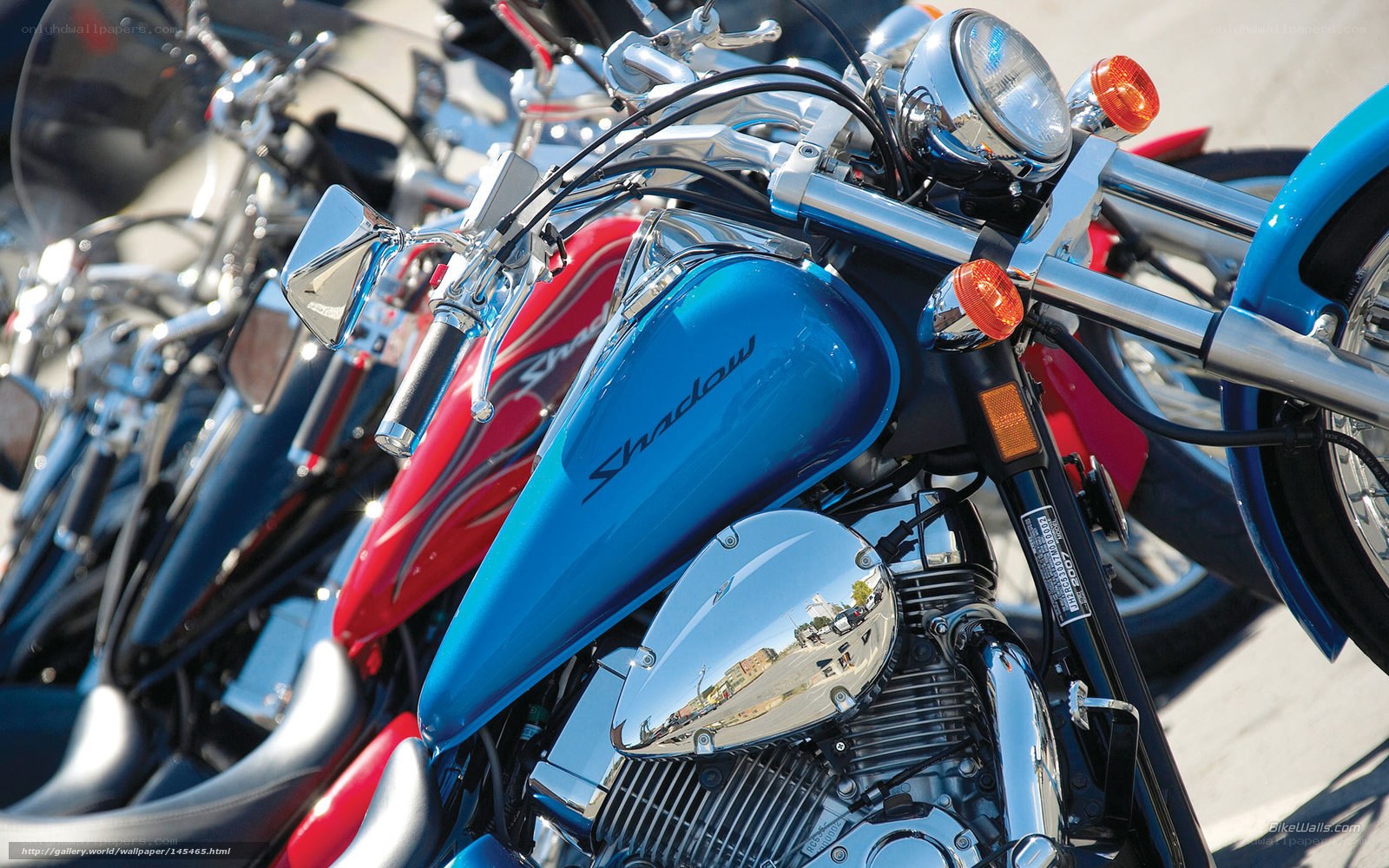 Blue and red motorcycles in a row